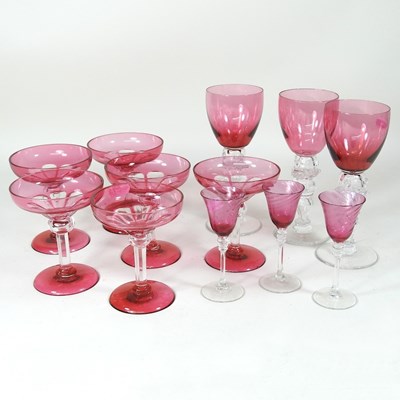 Lot 372 - A set of six cranberry overlaid stem glasses,...