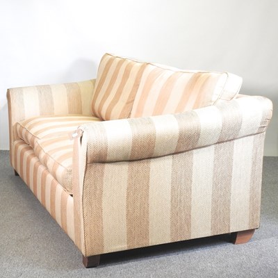 Lot 203 - A gold striped upholstered sofa, with loose...