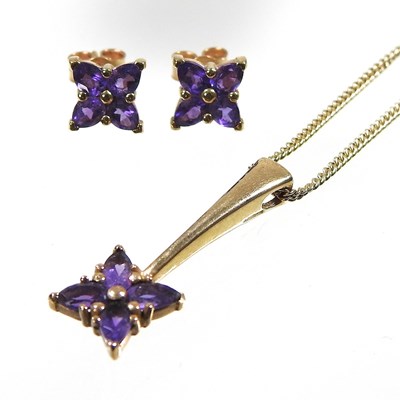 Lot 555 - A 9 carat gold and amethyst necklace and...