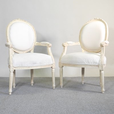 Lot 466 - A pair of 20th century French style cream...