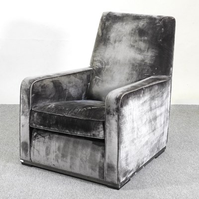 Lot 222 - A grey velvet upholstered armchair, designed...