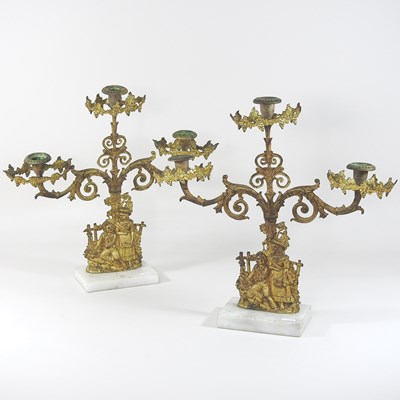 Lot 202 - A pair of 19th century continental gilt three branch gilt metal candelabra