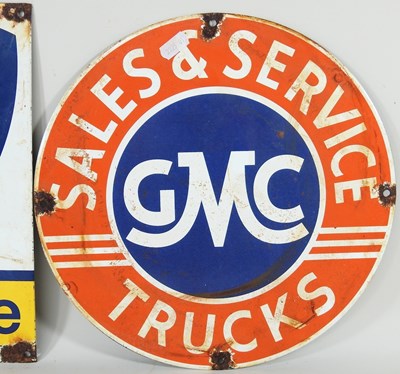 Lot 362 - A circular vintage style enamel sign, GMC,...