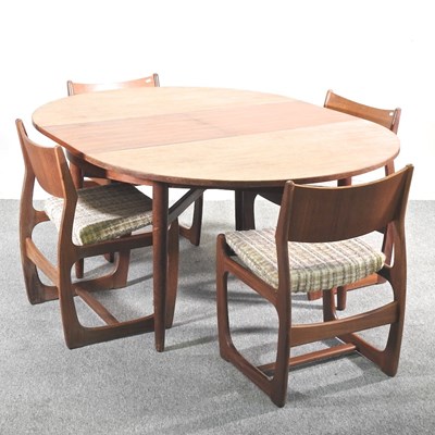 Lot 199 - A 1960's teak Danish style dining suite,...