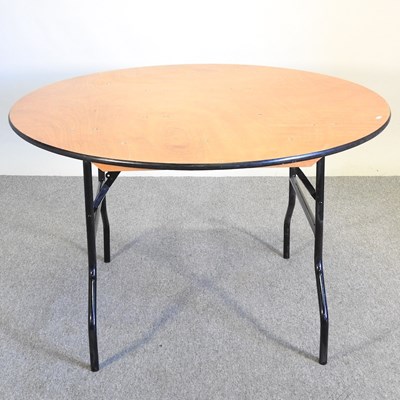 Lot 243 - A circular folding trestle table, 123cm