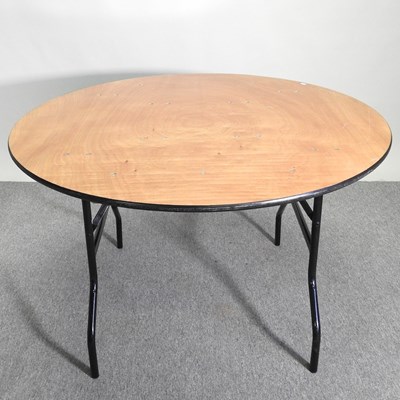 Lot 469 - A circular folding trestle table, 123cm