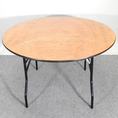 Lot 321 - A circular folding trestle table, 123cm