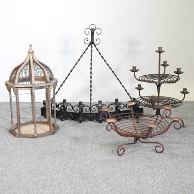 Lot 358 - Three iron candlestick holders, together with...