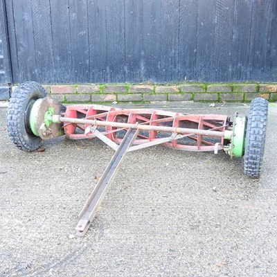 Lot 225 - A tractor driven pull-along rotary lawn mower,...