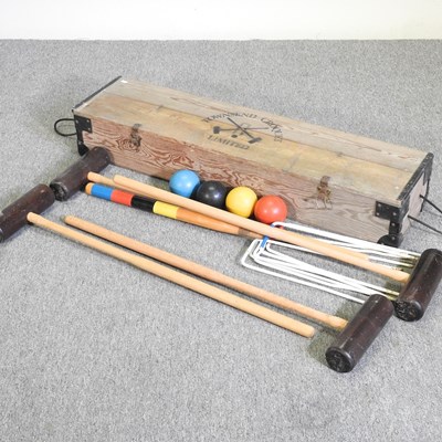 Lot 305 - A Townsend croquet set, in a wooden box, 108cm