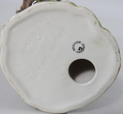 Lot 308 - A Beswick pottery model of a woodpecker, 22cm...