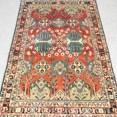 Lot 525 - A Persian rug, with an arrangement of...