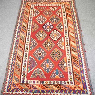 Lot 598 - A Persian qashqai kilim, with all over...