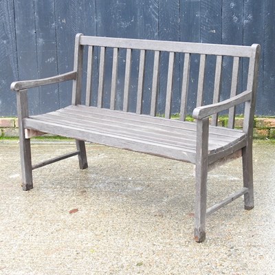 Lot 403 - A slatted hardwood garden bench