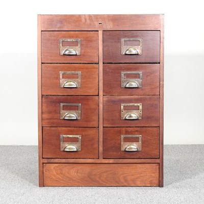 Lot 167 - A mid 20th century hardwood filing chest,...