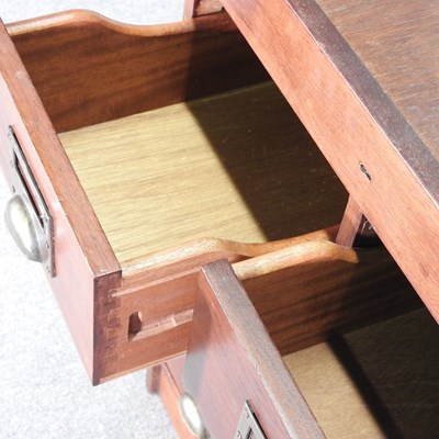 Lot 167 - A mid 20th century hardwood filing chest,...