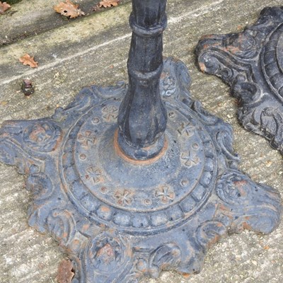 Lot 513 - A pair of cast iron table bases, 70cm high (2)