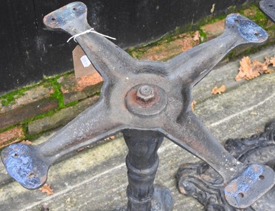 Lot 513 - A pair of cast iron table bases, 70cm high (2)