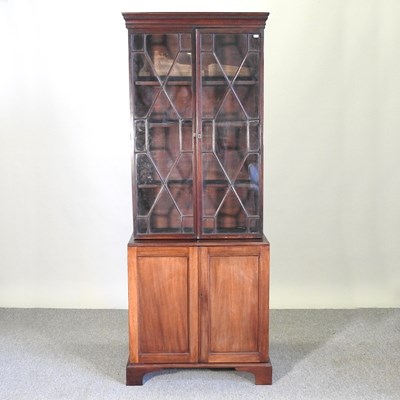 Lot 382 - A 19th century mahogany cabinet bookcase, with...