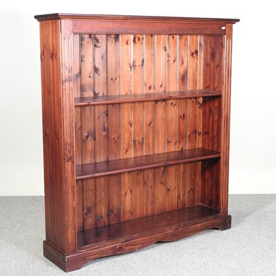 Lot 328 - A modern stained pine standing open bookcase