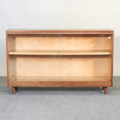 Lot 624 - A mid 20th century teak dwarf bookcase, with...