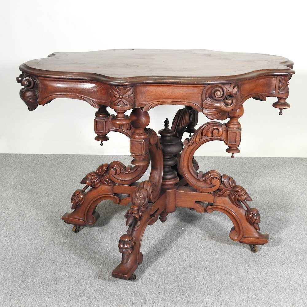 Lot 273 - An ornate Victorian style carved centre