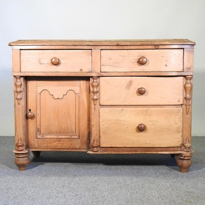 Lot 61 - An antique pine side cabinet, with three short...