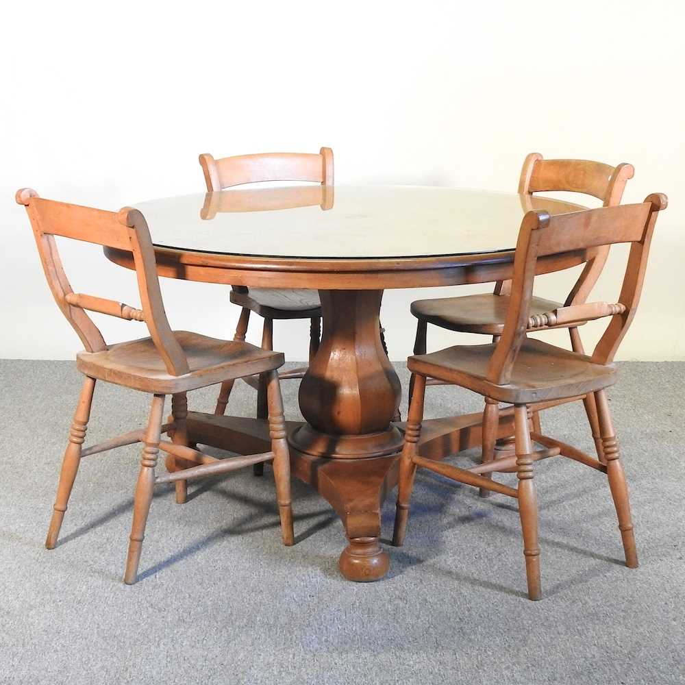 Lot 145 - A 19th century pine circular dining table,