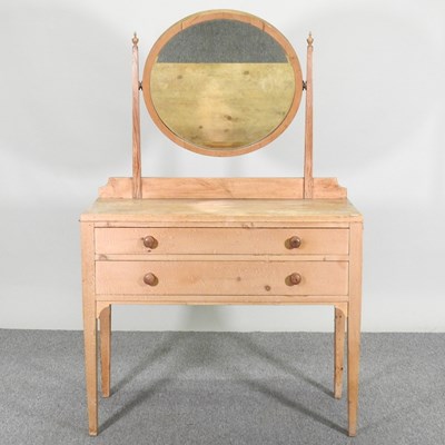 Lot 607 - An early 20th century pine dressing table, on...