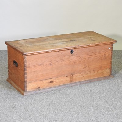 Lot 100 - An antique pine box, with  a hinged lid,...