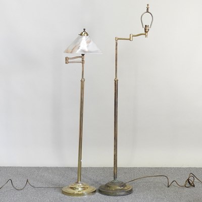 Lot 269 - A brass floor standing reading lamp, with a...