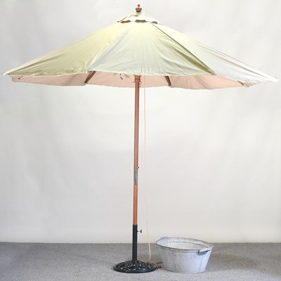 Lot 343 - A folding garden parasol, boxed, together with...