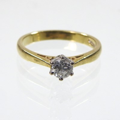 Lot 249 - An 18 carat gold solitaire diamond ring,...