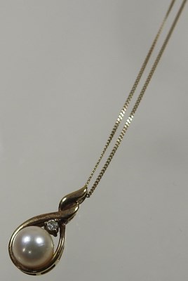 Lot 554 - A 9 carat gold bangle, with engraved...