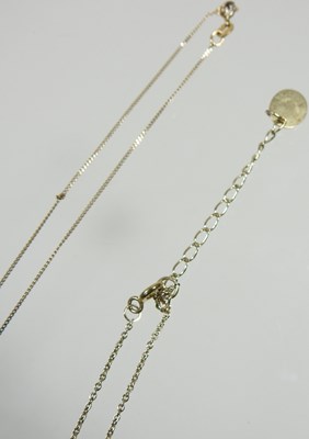Lot 554 - A 9 carat gold bangle, with engraved...