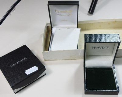 Lot 554 - A 9 carat gold bangle, with engraved...