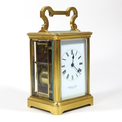 Lot 377 - A gilt brass cased carriage clock, the enamel...