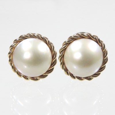 Lot 80 - A pair of 9 carat gold cultured pearl earrings,...