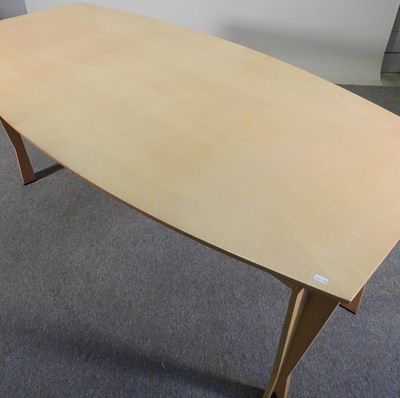 Lot 600 - A modern beech dining table, on shaped legs