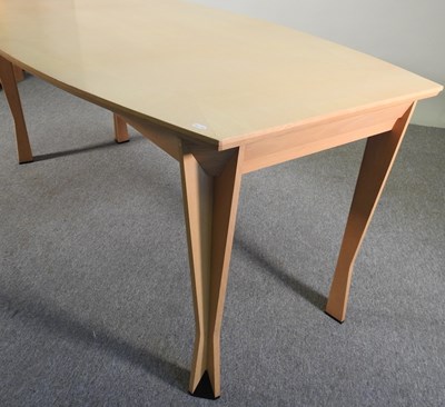 Lot 600 - A modern beech dining table, on shaped legs