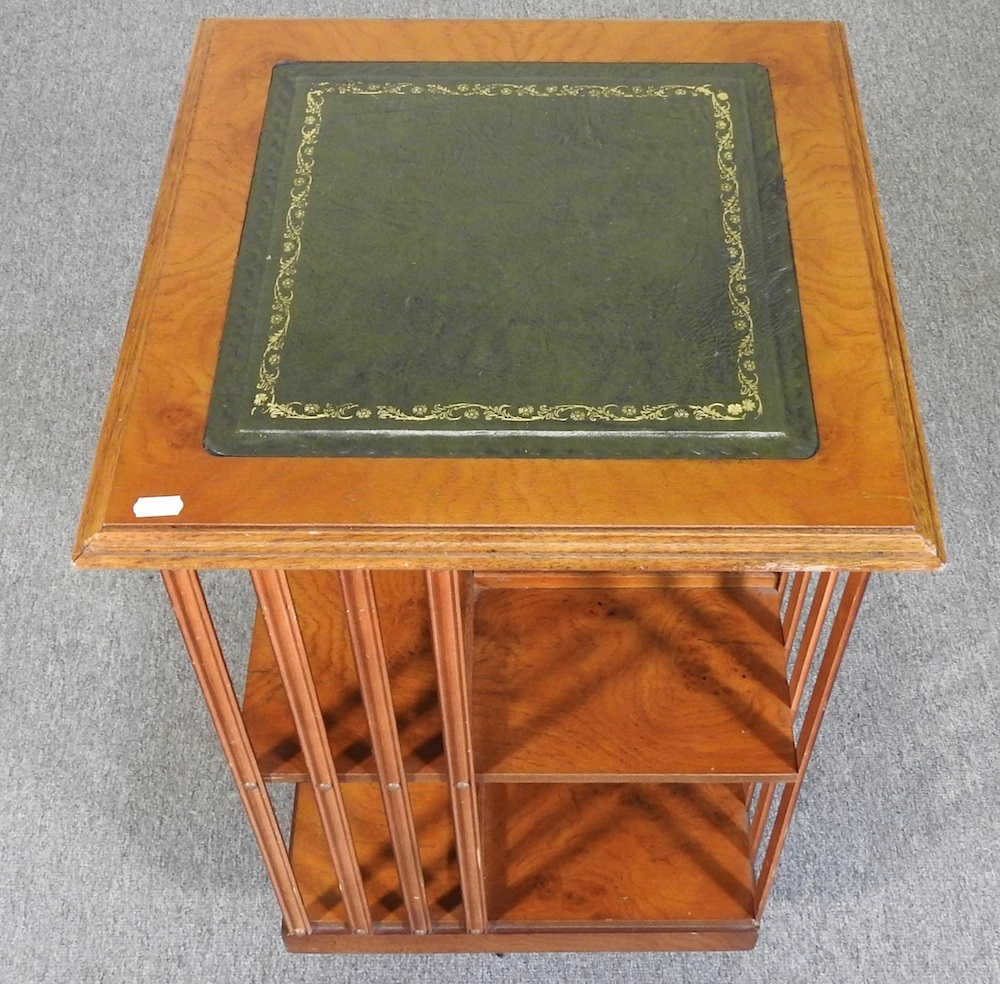 Lot 156 A yew wood reproduction revolving bookcase