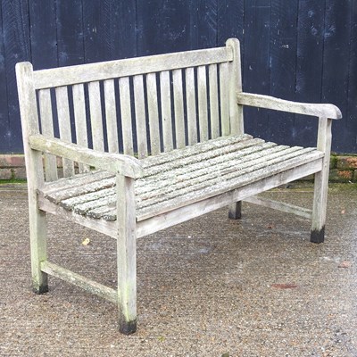 Lot 347 - A teak slatted wooden garden bench