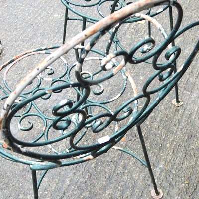 Lot 51 - A metal garden table and pair of chairs (3)