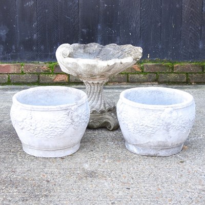 Lot 305 - A pair of reconstituted stone garden pots,...