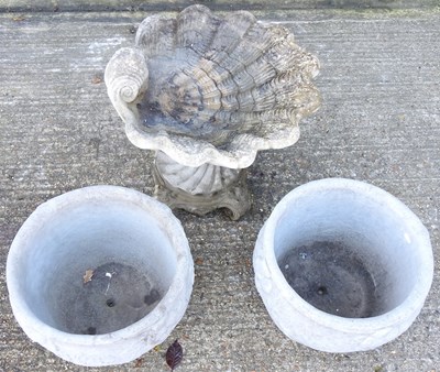 Lot 305 - A pair of reconstituted stone garden pots,...