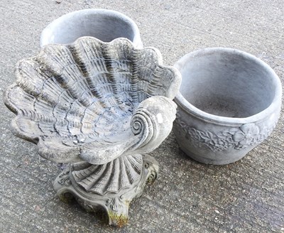 Lot 305 - A pair of reconstituted stone garden pots,...