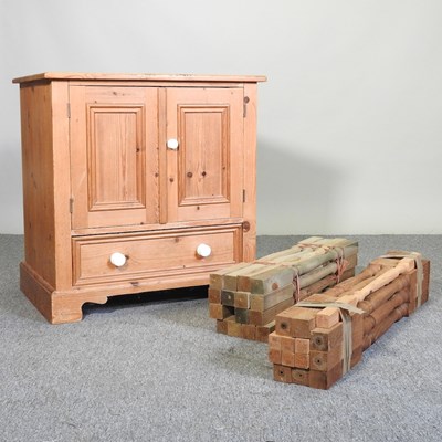 Lot 106 - A pine cabinet, together with a collection of...