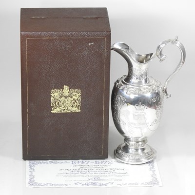 Lot 383 - A Garrard silver wine jug, of baluster shape,...