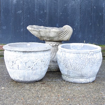 Lot 166 - A reconstituted stone garden pot, together...