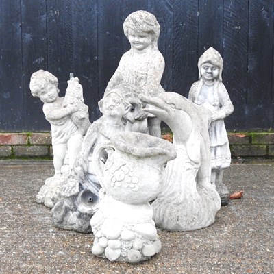 Lot 326 - A collection of cast stone water features,...